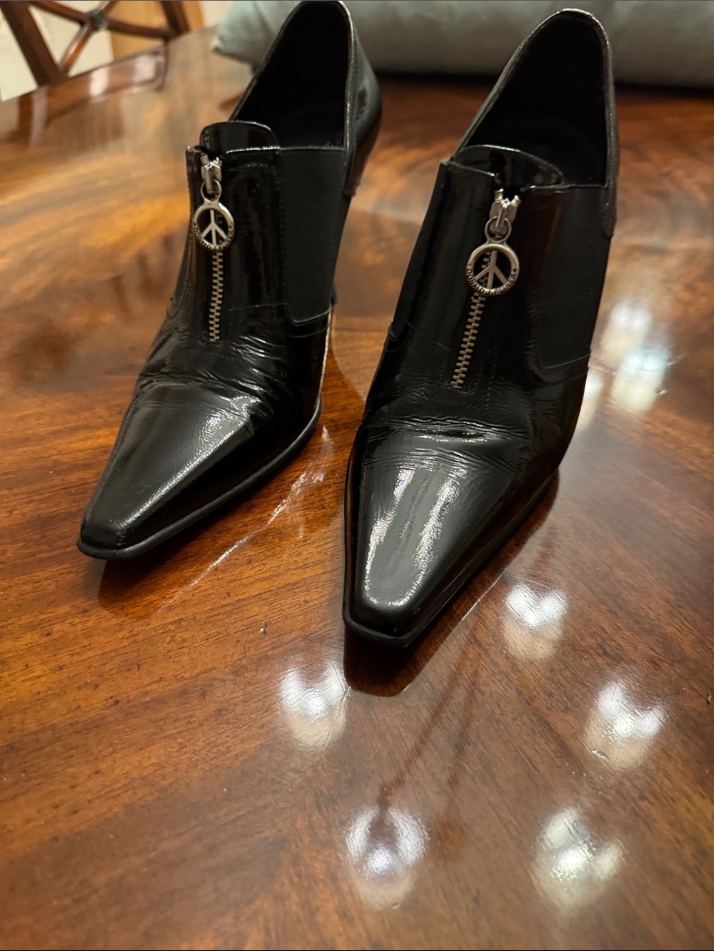 Donald J. Pliner Black Patent Pointed Zip Booties with Peace Charm